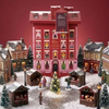 Calendrier de l'Avent Du Bruit dans la Cuisine en forme de manoir rouge avec 24 thés Sip The Season dans un village